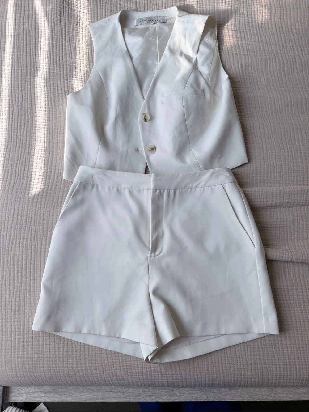Sleeveless White vest and shorts set
